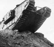 A British Mk IV heavy tank negotiates a German trench near Cambrai, France in October 1917.