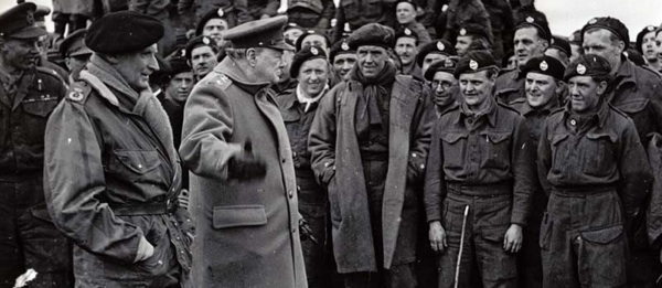 Churchill and Gen. Sir Bernard Montgomery congratulate members of the 79th Armored Division during a visit to the 2nd Army section in March 1945. National Archives.