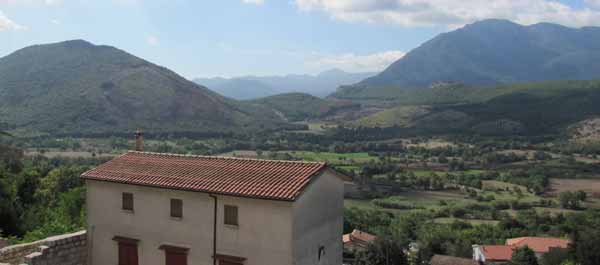 The mountains south of San Pietro were the scenes of bloody battles fought in 1943. In the distance is the Mignano Gap and on the right is Monte Lungo. (Carlo D’Este)